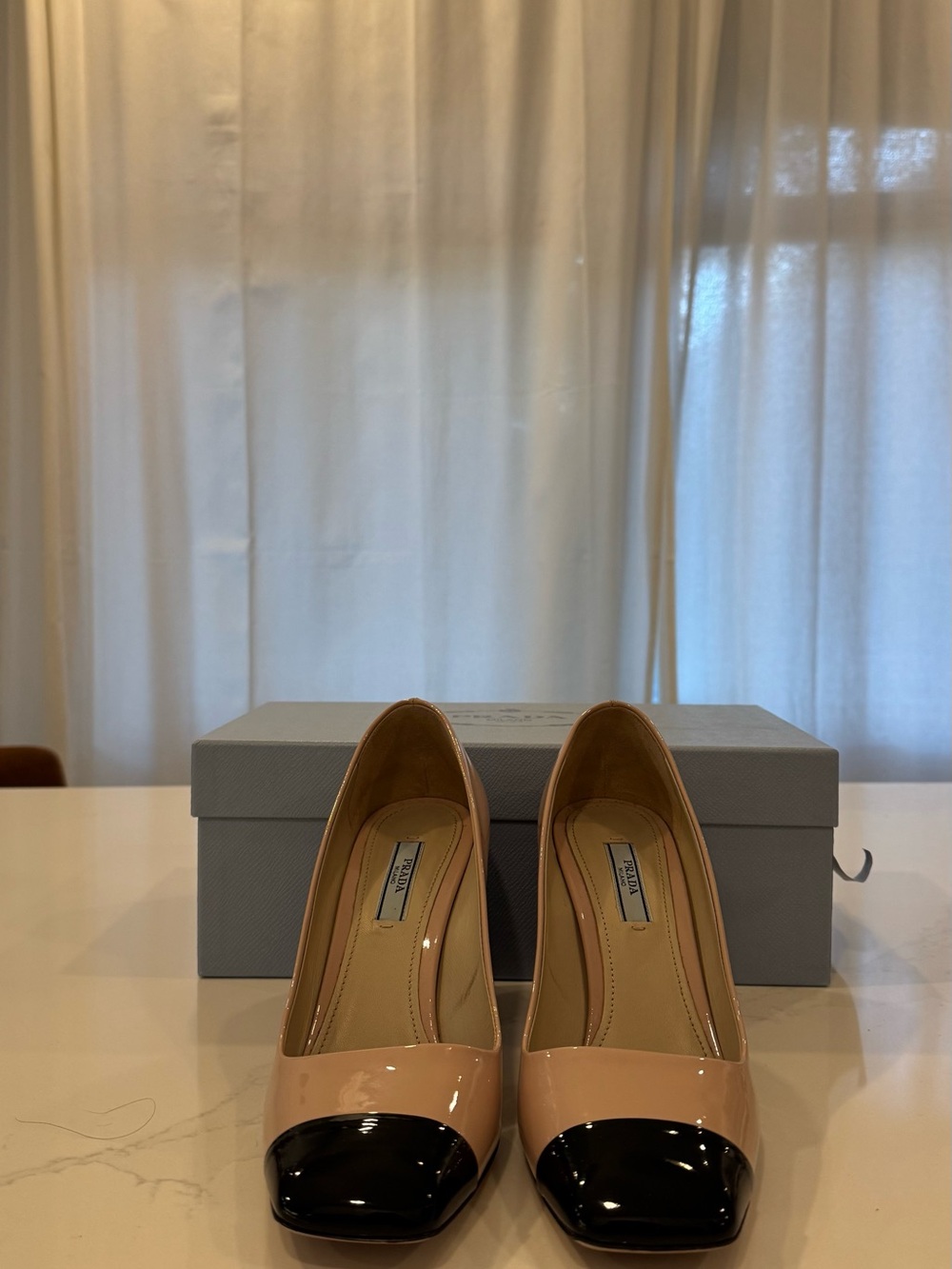 Prada Beige Patent Leather Pumps with Black Cap Toe